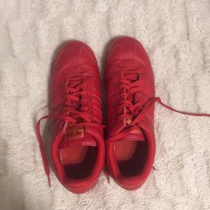 red adidas tennis shoes